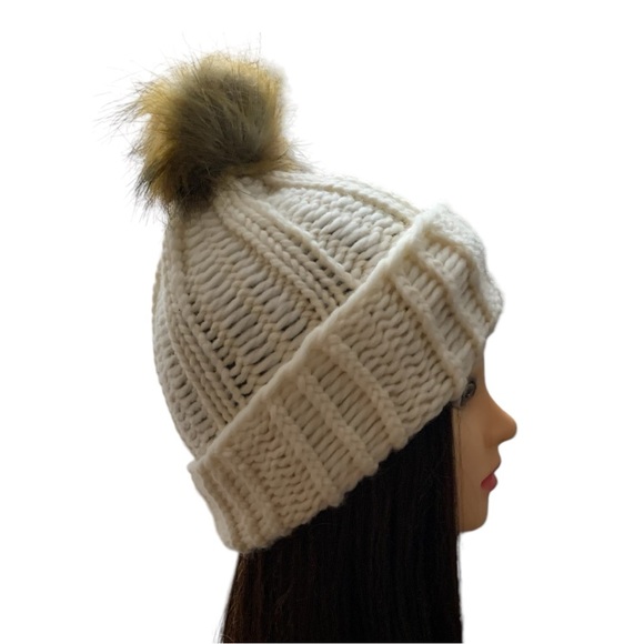 New! Cream color knit hat made with alpaca yarn, featuring a tan pom-pom. OS - Picture 2 of 4